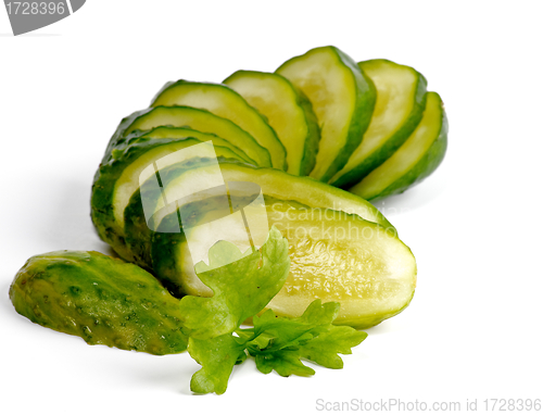 Image of Slices of Pickled cucumbers with parsley 