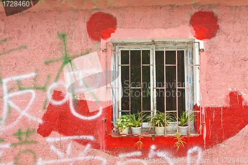 Image of Chinese house with window and colorful wall