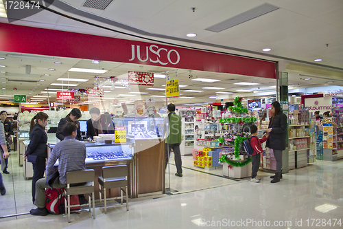 Image of Jusco brand in a shopping mall
