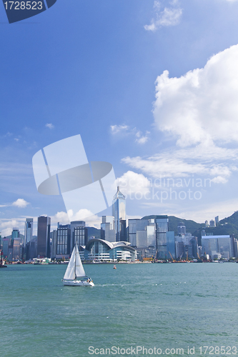 Image of Hong Kong with sail boat at day along Victoria Harbour