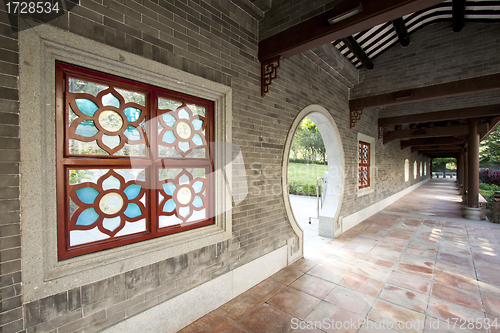 Image of Chinese style corridor in a garden