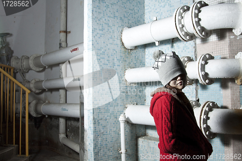 Image of Asian woman in a factory showing its stress and sadness
