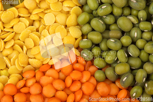 Image of Yellow split, red "football" lentils and green mung beans