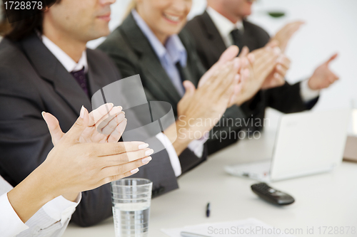 Image of business people applauding