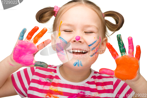 Image of Portrait of a cheerful girl with painted hands