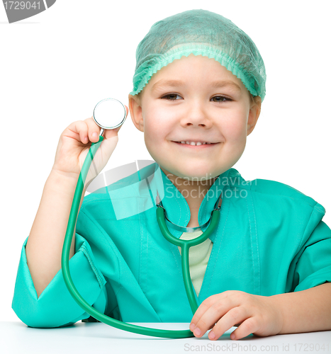 Image of Little girl is playing doctor with stethoscope