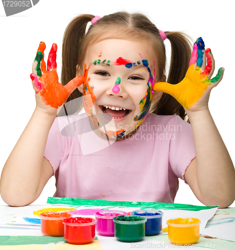 Image of Cheerful girl with painted hands