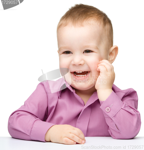 Image of Portrait of a cute and happy little boy