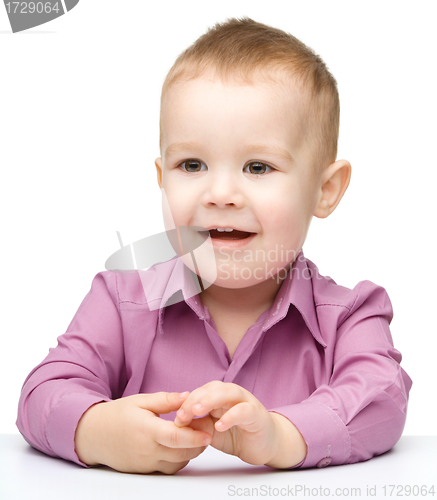 Image of Portrait of a cute and pensive little boy