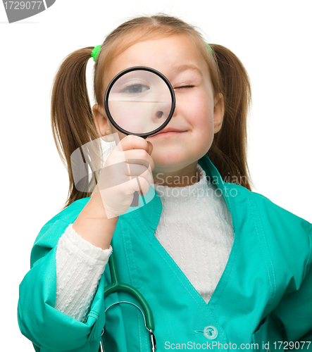 Image of Little girl is playing doctor
