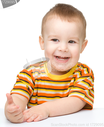 Image of Portrait of a cute cheerful little boy
