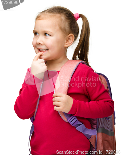 Image of Portrait of a cute schoolgirl with backpack