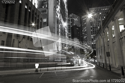 Image of Traffic in city at night in black and white toned