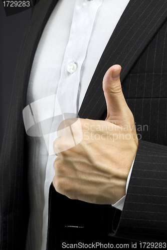 Image of Business man with thumbs up