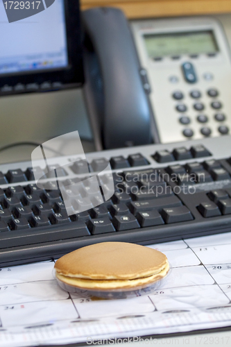 Image of Office breakfast with office tools