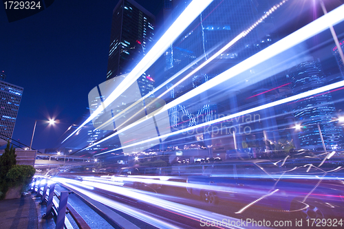 Image of City traffic at night with light trails