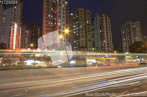 Image of Busy traffic in city at night