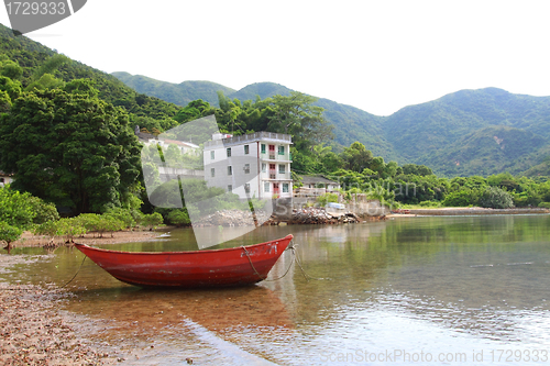 Image of Isolated boat along the coast