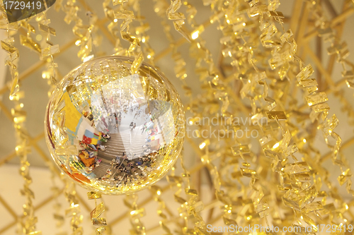 Image of Christmas decorations with golden color