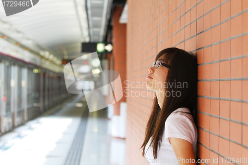 Image of Asian woman thinking 