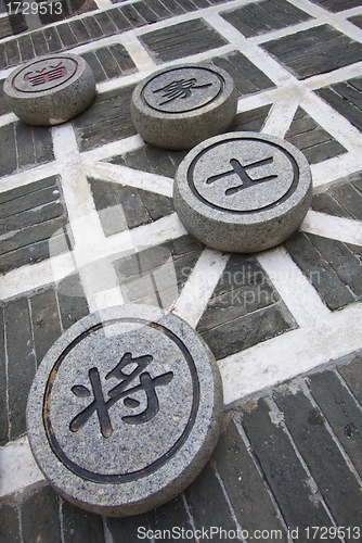 Image of Chinese chess on the ground