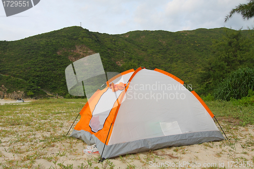 Image of Wild camping on beach with tent