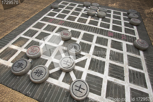 Image of Chinese chess on the ground