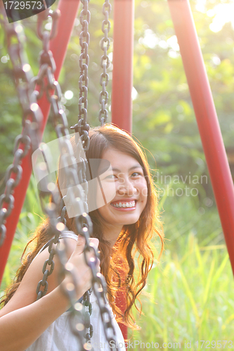 Image of A beautiful and cheerful asian woman