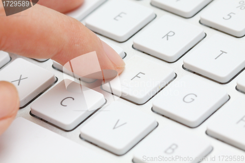 Image of Human hands using keyboard