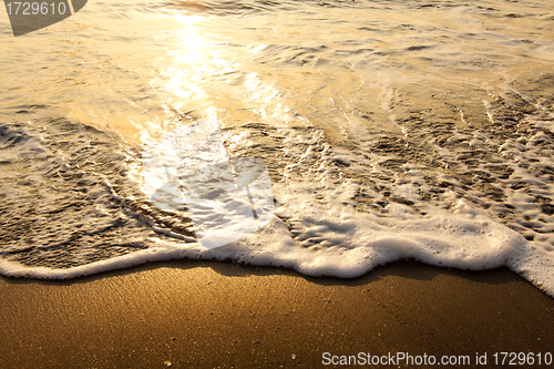 Image of Wave under sunset for background use