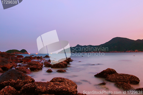 Image of Sunset along the coast under long exposure