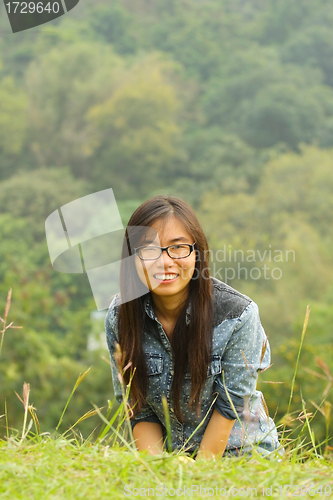 Image of Asian girl in countryside