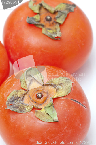 Image of Orange persimmons isolated on white background