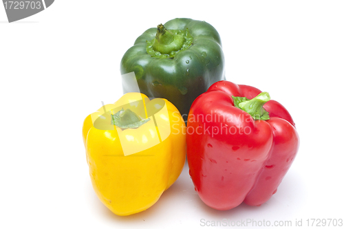 Image of Bell peppers (green, yellow and red) isolated on white backgroun