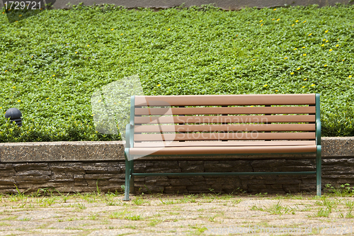 Image of A wooden chair in countryside
