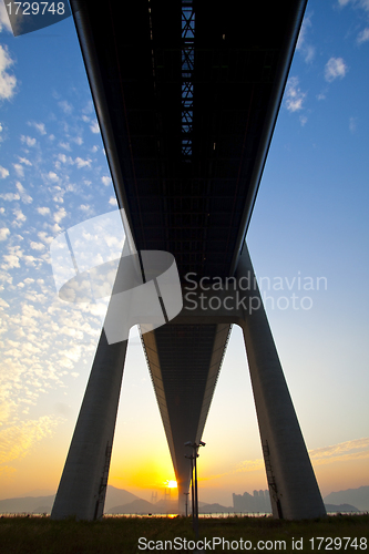 Image of Tsing Ma Bridge landmark in Hong Kong under sunset