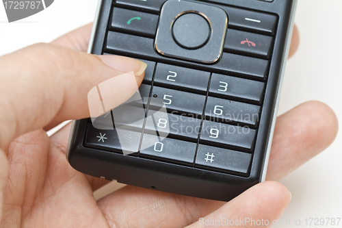 Image of Hand using cellphone