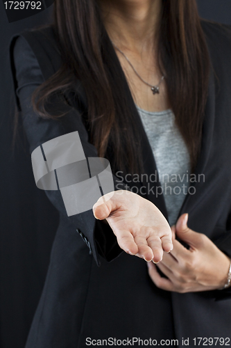 Image of Business woman gives a handshake