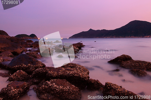 Image of Sunset along the coast. Nature composition under long exposure.