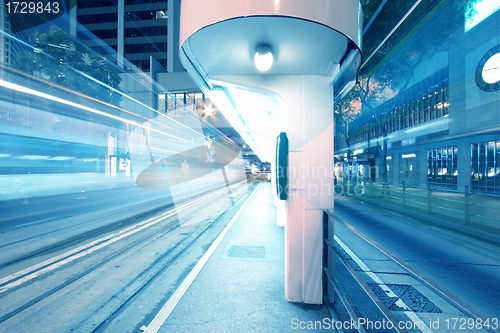 Image of Traffic in city with light trails