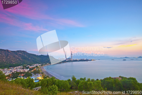 Image of Power station along the seashore at sunset time