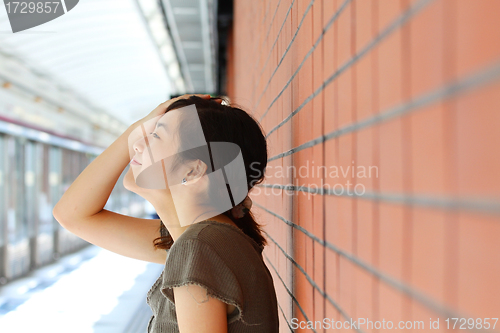 Image of Asian woman with cute expression