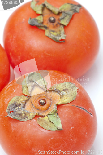 Image of Orange persimmons isolated on white background