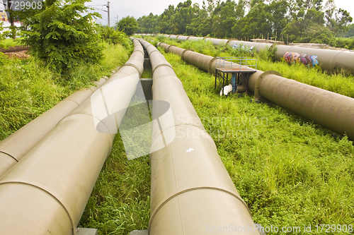 Image of Industrial pipelines on the ground 