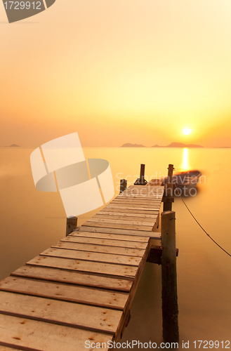 Image of Jetty sunset over the ocean 