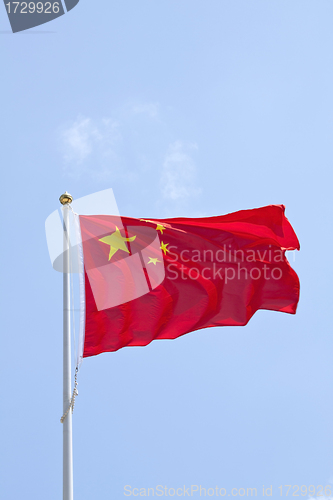 Image of China flag in blue sky