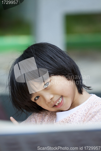 Image of Asian young girl smiling