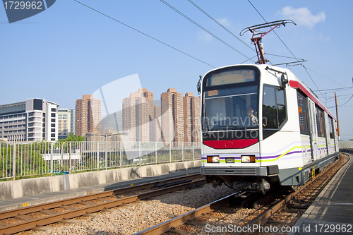 Image of Moving train in Hong Kong at day