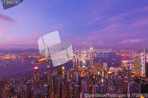 Image of Hong Kong with many office buildings at sunset