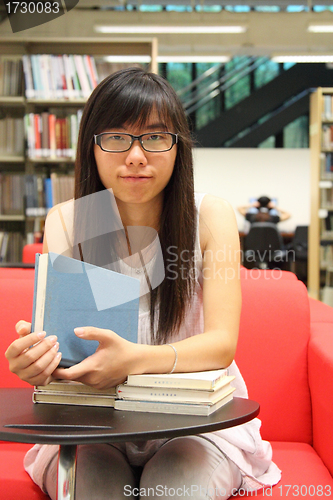 Image of Asian girl student in library